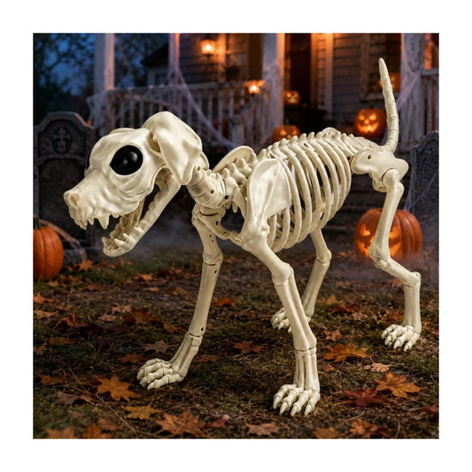 A bone-white skeleton dog sitting on a lawn at night