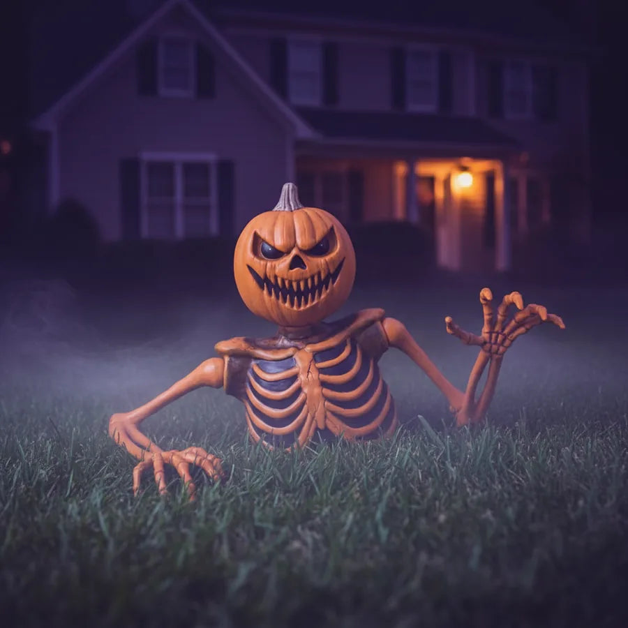 Hollowjack 35 in Pumpkin Groundbreaker set up on a suburban front lawn at night, lit against the house
